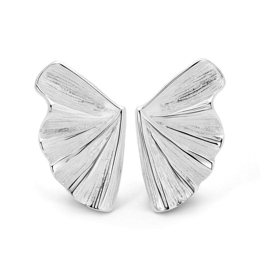 Silver earrings with a wing-like design on a white background
